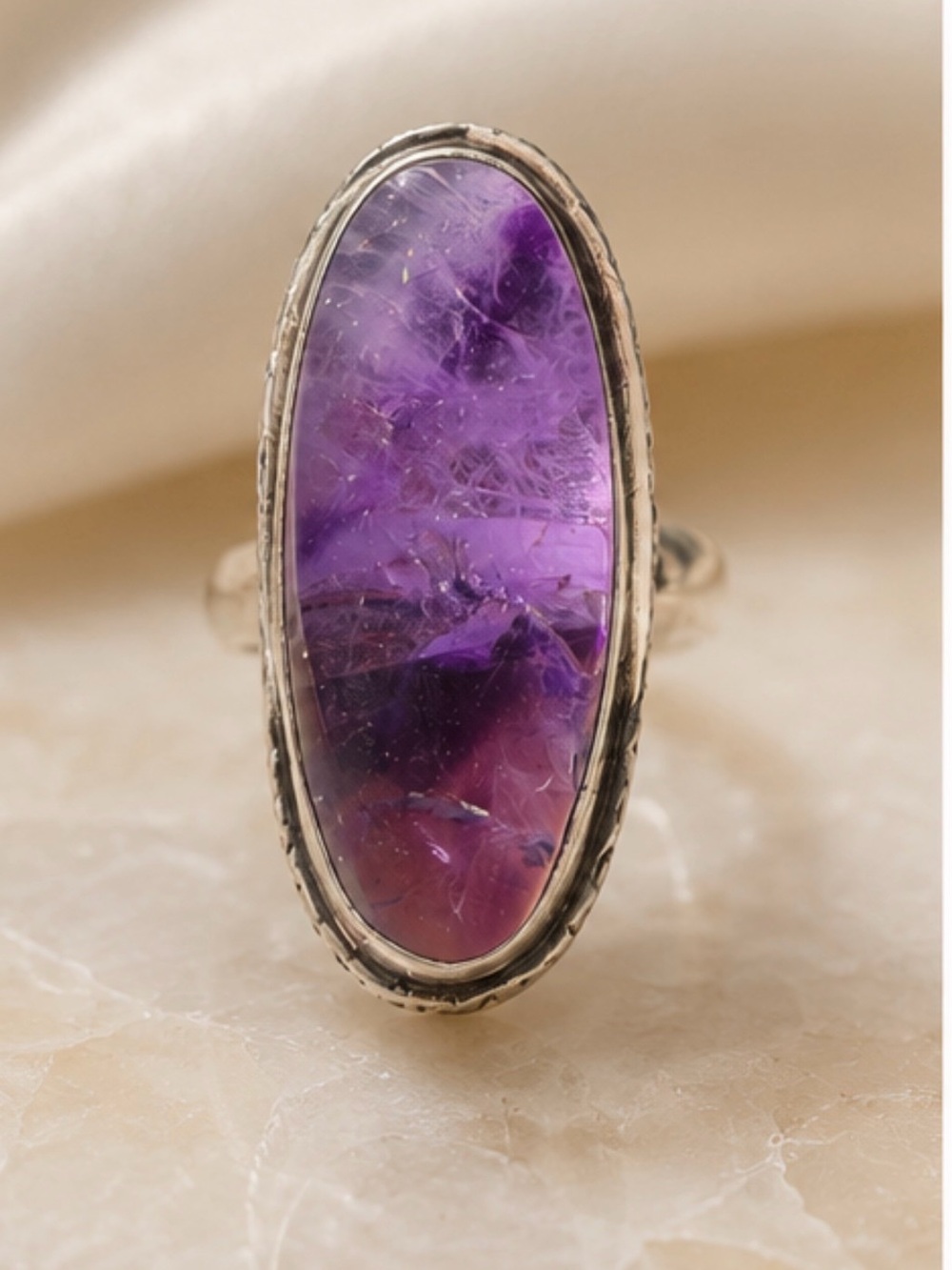 Silver Ring with Purple Oval Gemstone